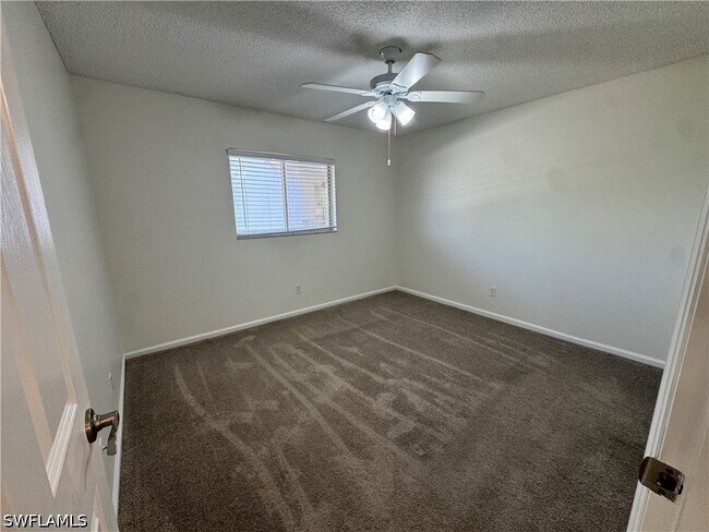 Building Photo - 12250 Tamiami Trl E