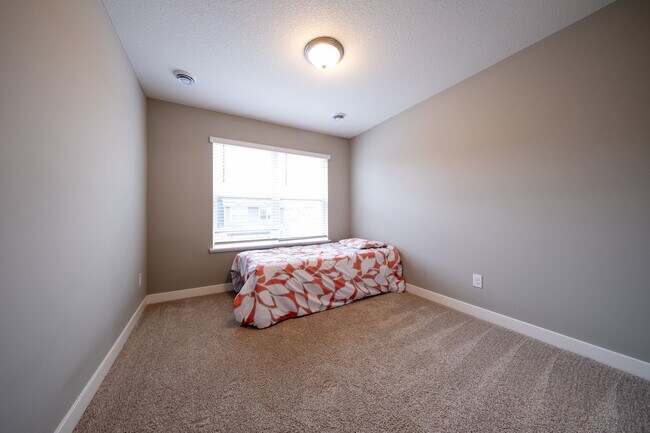 Building Photo - 6464 Genevieve Trail