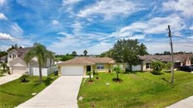 Building Photo - Charming 3-bed, 2-bath POOL home with 2-car garage. Features ceramic tile flooring, updated kitch...