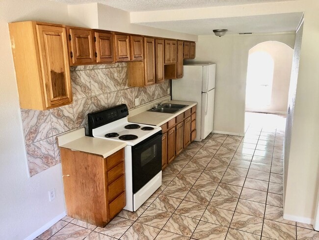 Building Photo - Spacious 3BR/1BA with Huge Yard & Charming...