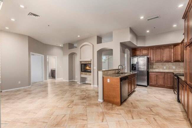 Building Photo - 9268 E Aster Dr