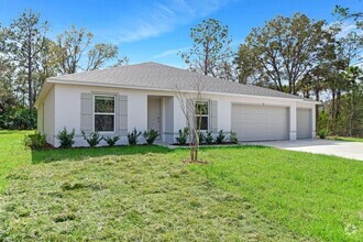 Building Photo - Stunning new home with 3 car garage