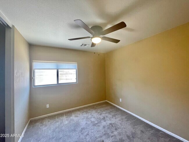 Building Photo - 15672 W Port Au Prince Ln