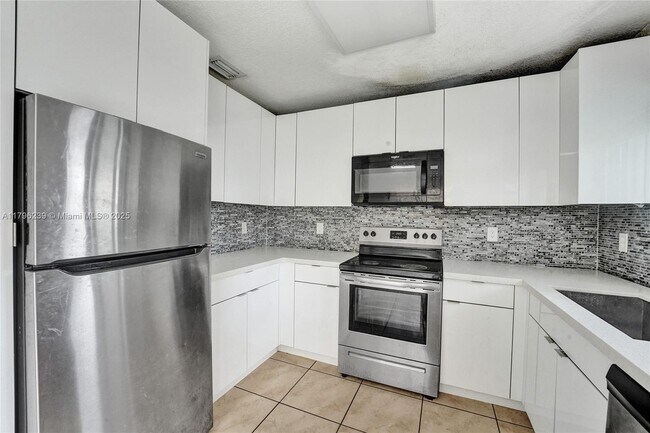Building Photo - 1154 NW 103rd St