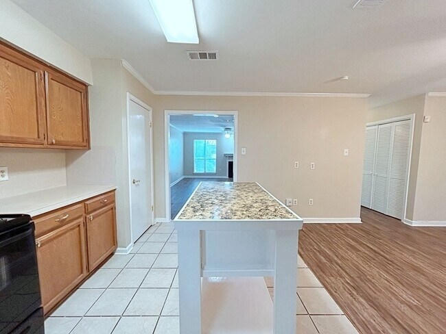 Building Photo - Prime 3 Bed, 2.5 Bath with Fireplace & Fenced Patio!