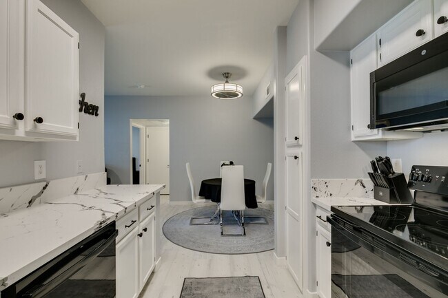 Building Photo - Stylish Fully Furnished 1BR Condo with Private Patio & Custom Closet