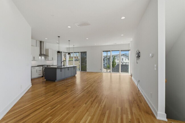 Building Photo - Beautiful 3-BR Property with Rooftop Deck!