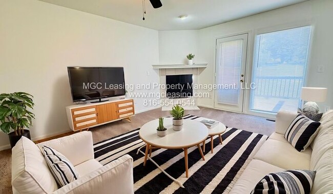 Building Photo - Creekwood Park Townhomes — Reduced rent + claim your choice of a brand-new 55" TV or a $250 Amazo...