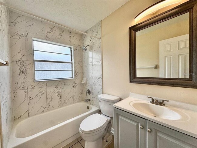 Building Photo - 10015 N Aster Ave