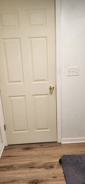 Inside downstairs bathroom with door closed - 2116 Thaler Ave