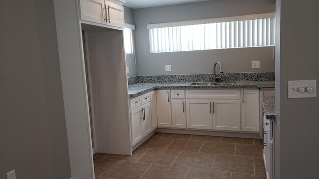 Building Photo - 2057 W Florence Ave