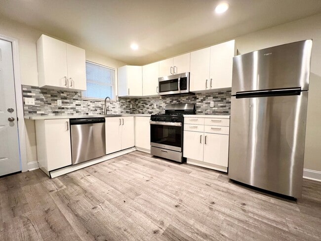 Primary Photo - Updated 2BR house with off street parking!