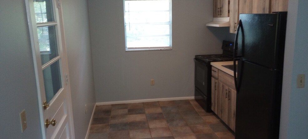 Carport Door into Kitchen - 105 Magnolia Dr