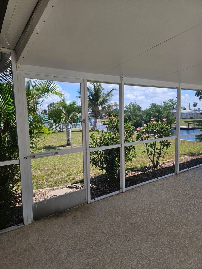 Building Photo - Port Charlotte Waterfront salt water pool annual rental