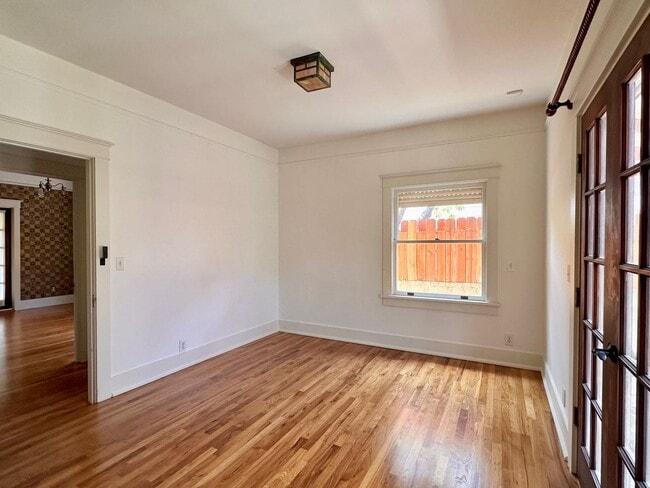 Building Photo - Meticulously Restored 1920s Craftsman on a Private, Hedged Lot | Pet Friendly!