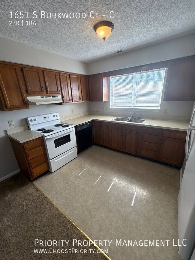 Building Photo - 1651 S Burkwood Ct