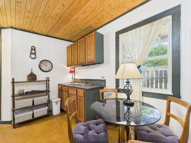 Building Photo - Charming Studio with Large Bathroom, Cute Kitchen & Private Fenced Yard