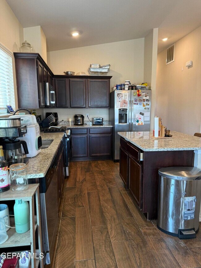 Building Photo - 12976 Runway Ave