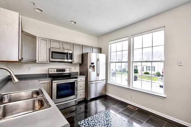 Building Photo - Modern Comfort Meets Everyday Convenience in this Stunning Forest Hill Townhome with 3 Beds & 3.5...