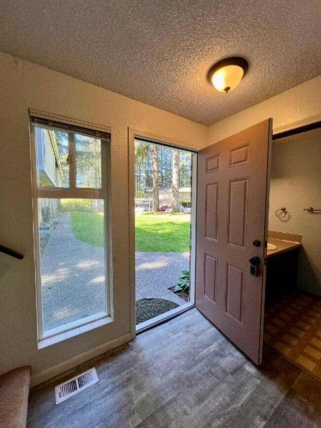 Building Photo - Black Lake Access! W/S/G Included