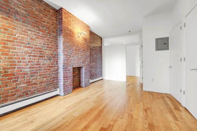 Building Photo - Welcoming  1-Bedroom with Home Office and Private Terrace.