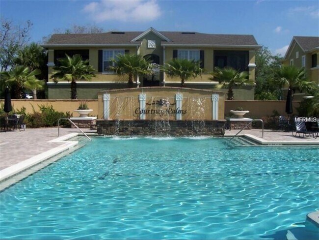 Building Photo - 10205 Courtney Palms Blvd