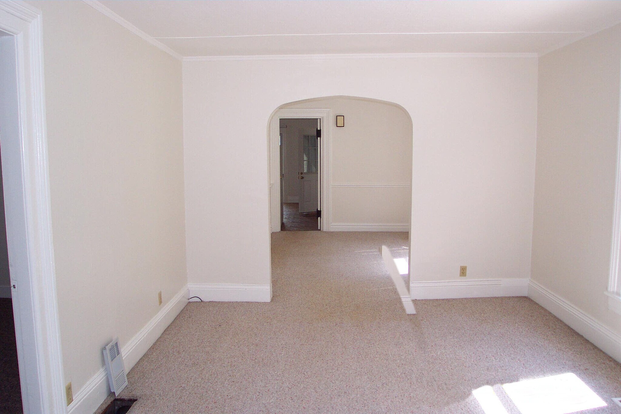 Living room looking into dining room - 69 Cypress St