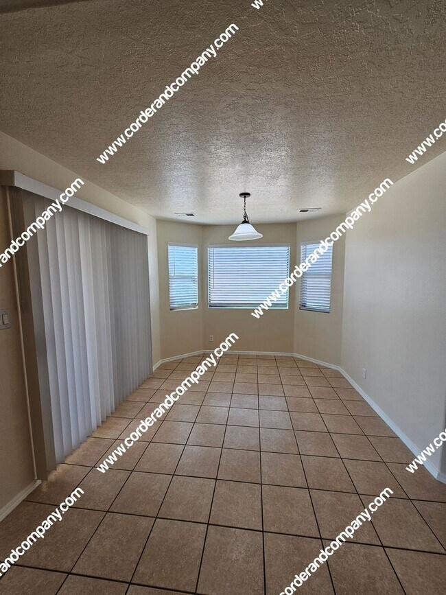 Building Photo - Custom 3 Bedroom, 2 Bathrooms, 2 Car Garage and 2,212 Sq Ft. Home with Beautiful Sandia Mountain ...