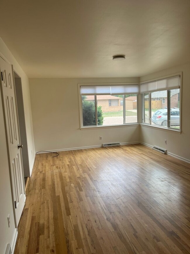 Building Photo - New Finishes in this Home on a Large Lot with Covered Parking and AIR CONDITIONING! MOVE IN READY!