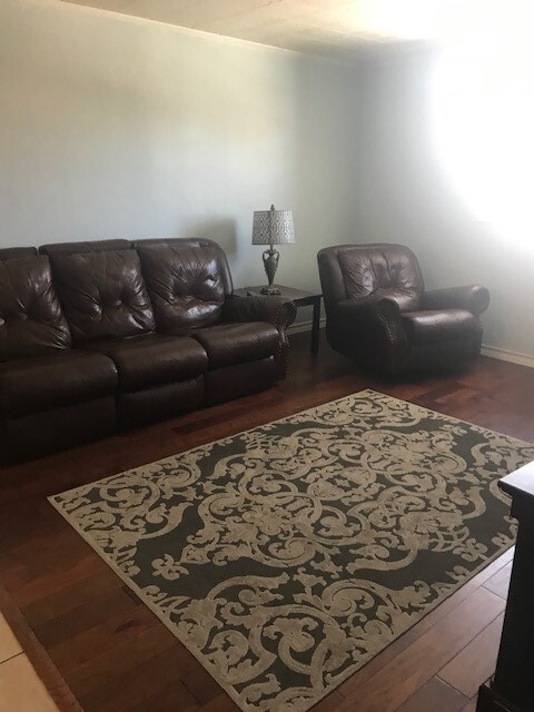 Leather sofa and rocking recliner - 326 W Concho Ave