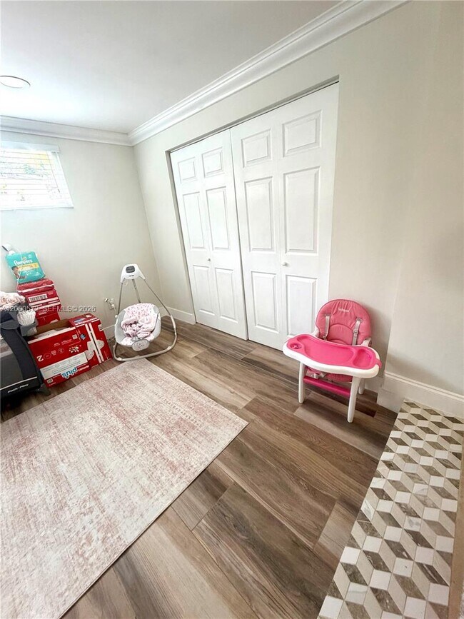 Building Photo - 6497 W 8th Ln