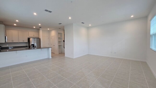 Building Photo - Brand-New Apopka 4Bed/2.5 Bath Townhome Avail for Rent! Be The first to Live Here!