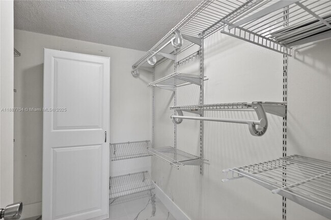 Building Photo - 9915 W Okeechobee Rd