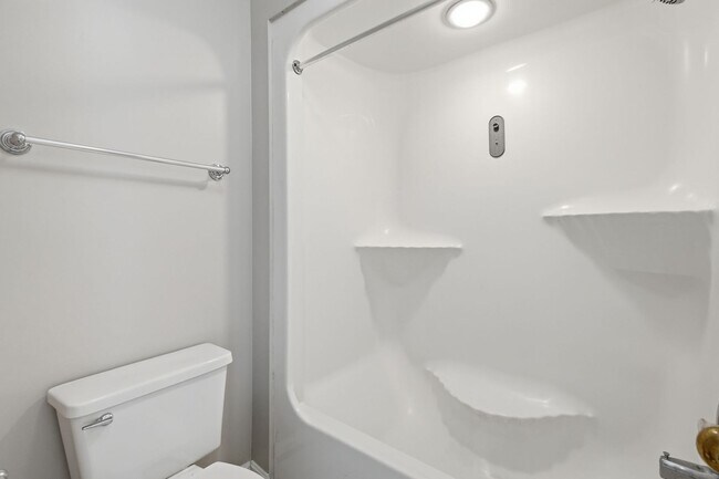 Building Photo - Contemporary design meets exceptional space in this inviting ground level residence, offering eff...