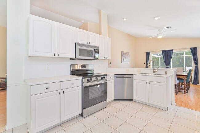 Building Photo - AVAILABLE June 1 - Single Family Pool Home in the Heart of Three Oaks