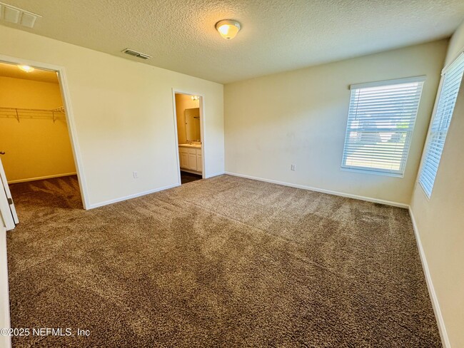 Building Photo - 8390 Meadow Walk Ln