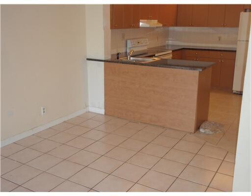 Building Photo - 11458 Royal Palm Blvd