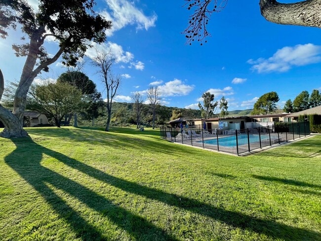 Building Photo - Single Story Condo on ground floor located...