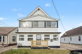 Building Photo - Updated First-Floor 2BR with Garage Parking and On-Site Laundry