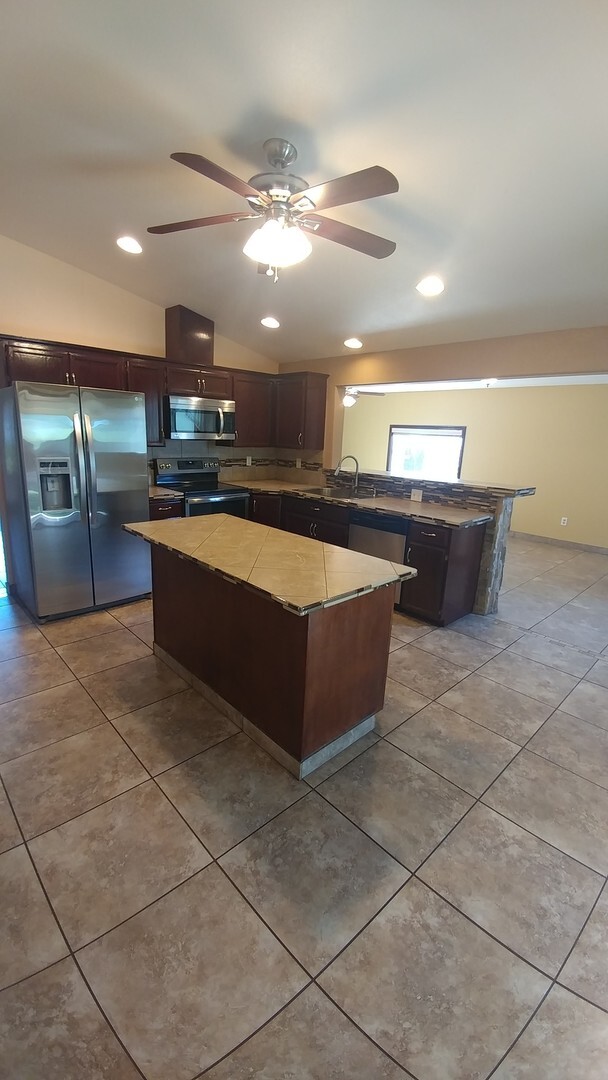 Building Photo - 4-Bed, 2-Bath Home Off Road 100 with Easy ...