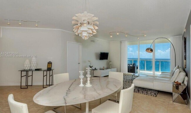 Building Photo - 16699 Collins Ave