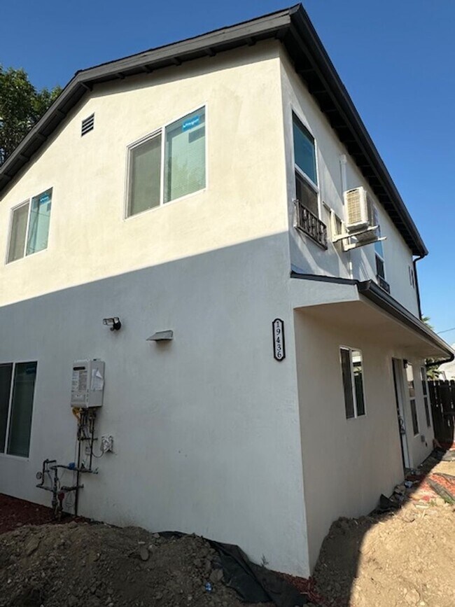 Building Photo - Completely remodeled and located on a quiet tree lines street in a beautiful pocket of Reseda. 3-...