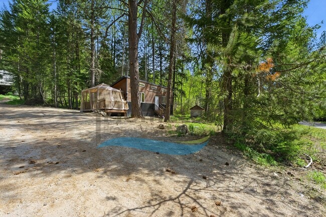Building Photo - 1 Bedroom 1 Bath Cottage Style Studio Home with Off Street Parking Available in Sagle, Idaho!