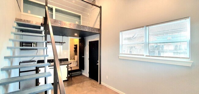 Building Photo - ALL BILLS PAID! Spacious LOFT living space...