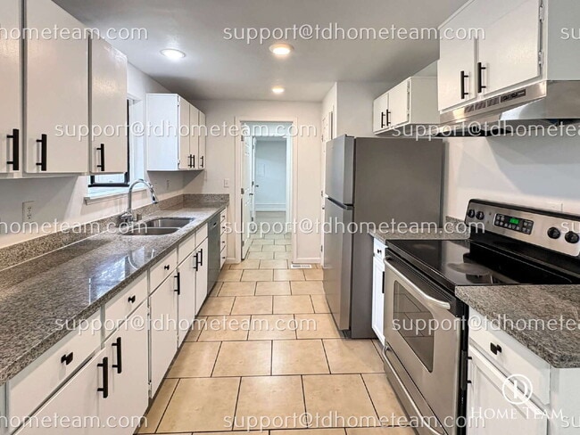 Building Photo - "Charming 4-Bed Retreat in Covington with Elegant Granite Touches!"