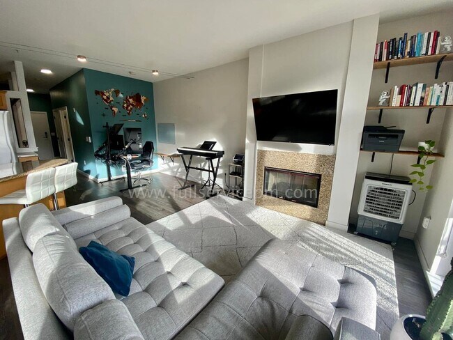 Building Photo - Stylish Capitol Hill Loft Condo w/ Floor-to-Ceiling Windows, Gas Fireplace