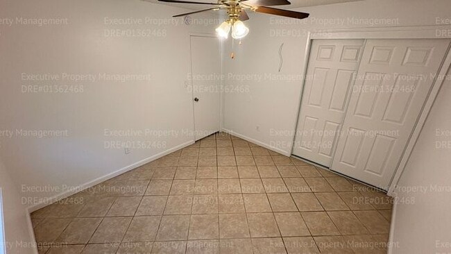 Building Photo - 3 bedroom 2 bathroom home on a corner lot with extra fenced parking.