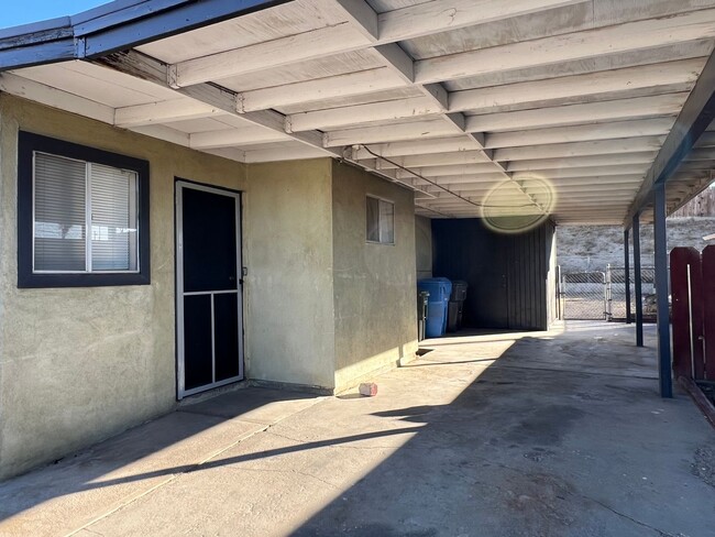 Building Photo - 3 Bedroom House with New Paint, Wood Floor...