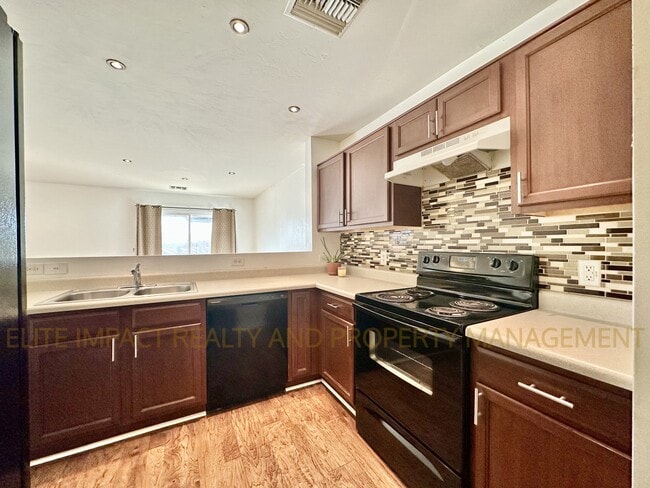 Building Photo - 5210 E Desert Straw Ln