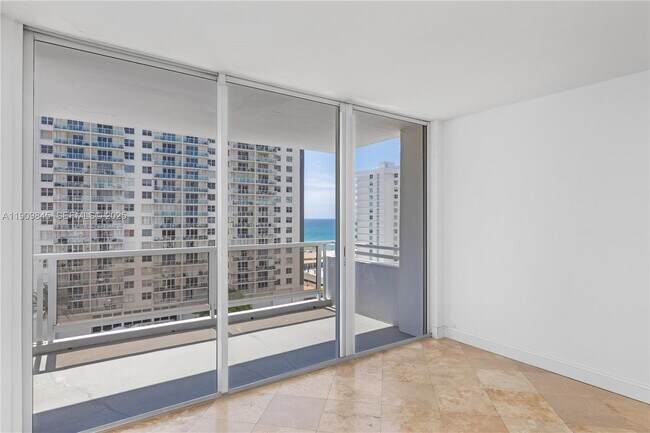 Building Photo - 5700 Collins Ave